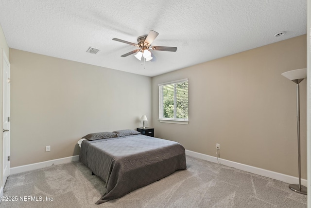 117 S Durbin Pkwy, Saint Johns, FL 32259 - carpeted bedroom featuring baseboards, a textured ceiling, and a ceiling fan