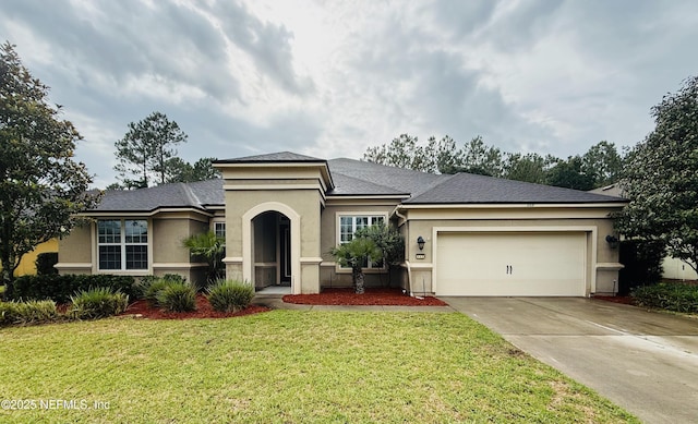 117 S Durbin Pkwy, Saint Johns, FL 32259 - view of front of home with stucco siding, driveway, an attached garage, a front lawn, and roof with shingles