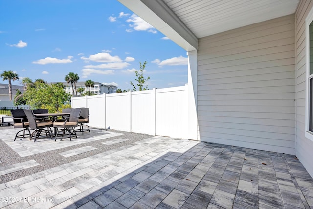 329 Rum Runner Way, Saint Johns, FL 32259 - fenced backyard with a patio and outdoor dining area