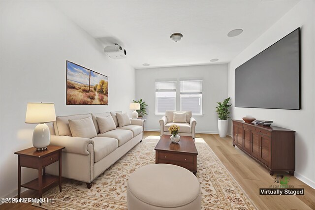 329 Rum Runner Way, Saint Johns, FL 32259 - living room with light wood-style floors and baseboards