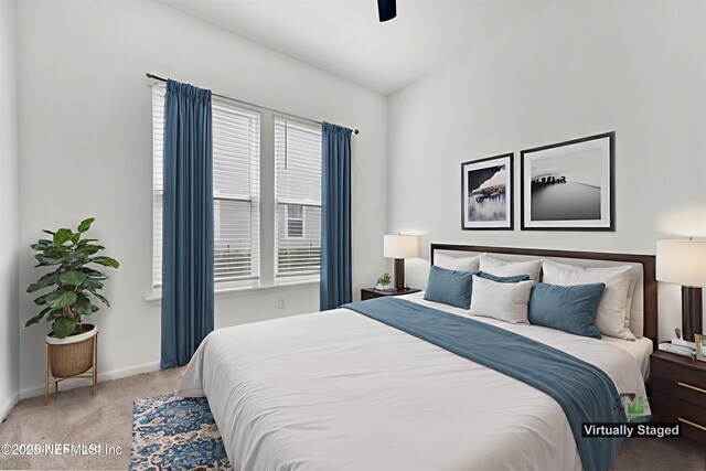 329 Rum Runner Way, Saint Johns, FL 32259 - carpeted bedroom featuring multiple windows, baseboards, and a ceiling fan