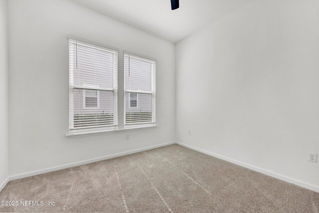 329 Rum Runner Way, Saint Johns, FL 32259 - carpeted spare room with baseboards and a ceiling fan