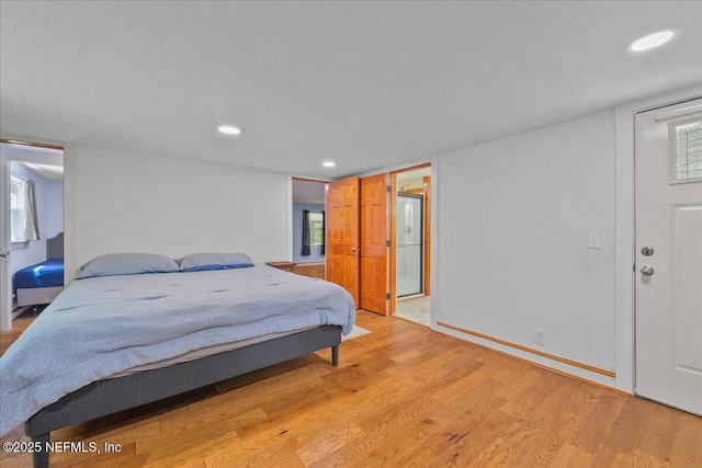 381 Bird Rd, Jacksonville, FL 32218 - bedroom with light wood finished floors and recessed lighting