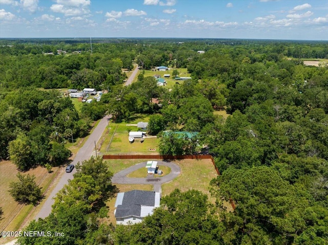 381 Bird Rd, Jacksonville, FL 32218 - aerial view of property and surrounding area featuring a heavily wooded area