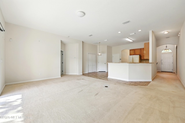 372 Johns Creek Pkwy, Saint Augustine, FL 32092 - unfurnished living room featuring light carpet, baseboards, and recessed lighting