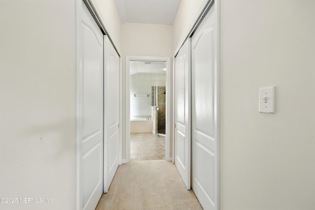 372 Johns Creek Pkwy, Saint Augustine, FL 32092 - corridor with light carpet