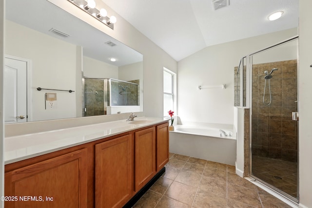 372 Johns Creek Pkwy, Saint Augustine, FL 32092 - full bathroom with a garden tub, vanity, a shower stall, and lofted ceiling
