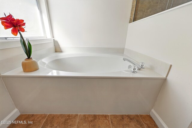 372 Johns Creek Pkwy, Saint Augustine, FL 32092 - bathroom with a garden tub