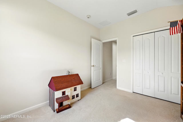 372 Johns Creek Pkwy, Saint Augustine, FL 32092 - unfurnished bedroom with carpet floors, baseboards, and a closet