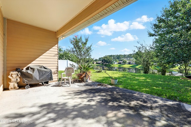 372 Johns Creek Pkwy, Saint Augustine, FL 32092 - view of patio with a grill and a water view