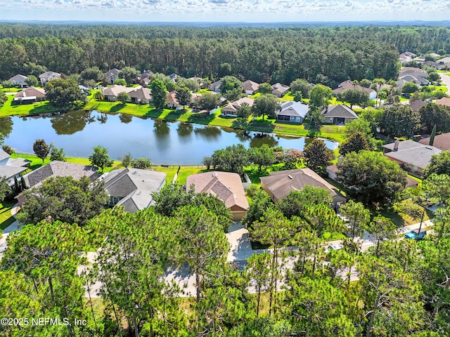 372 Johns Creek Pkwy, Saint Augustine, FL 32092 - aerial perspective of suburban area featuring a forest and a large body of water