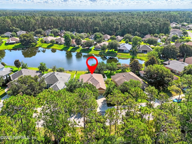 372 Johns Creek Pkwy, Saint Augustine, FL 32092 - aerial view of residential area featuring a heavily wooded area and a nearby body of water