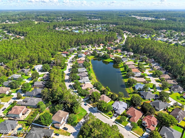 372 Johns Creek Pkwy, Saint Augustine, FL 32092 - aerial overview of property's location with a forest, a large body of water, and nearby suburban area