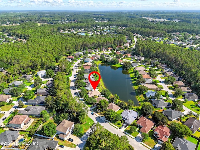 372 Johns Creek Pkwy, Saint Augustine, FL 32092 - aerial view of property and surrounding area with a forest, a large body of water, and nearby suburban area