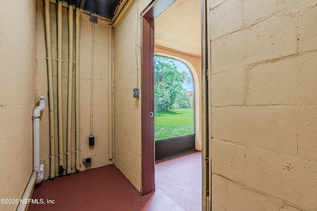 3916 Corrida Ct Unit 5, Jacksonville, FL 32217 - doorway to outside featuring concrete floors and concrete block wall