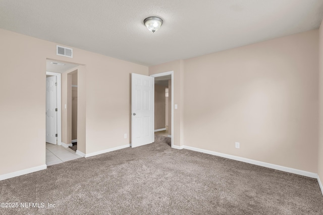 3916 Corrida Ct Unit 5, Jacksonville, FL 32217 - empty room featuring light carpet and baseboards