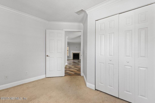 833 Shoreline Cir, Ponte Vedra Beach, FL 32082 - unfurnished bedroom featuring light colored carpet, ornamental molding, a closet, and baseboards