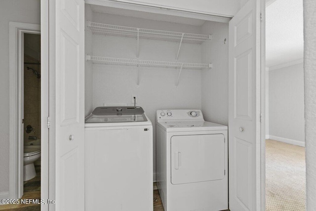 833 Shoreline Cir, Ponte Vedra Beach, FL 32082 - laundry area with washing machine and dryer and baseboards