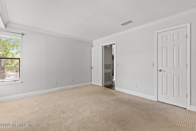 833 Shoreline Cir, Ponte Vedra Beach, FL 32082 - unfurnished bedroom with crown molding, carpet, a textured ceiling, and baseboards