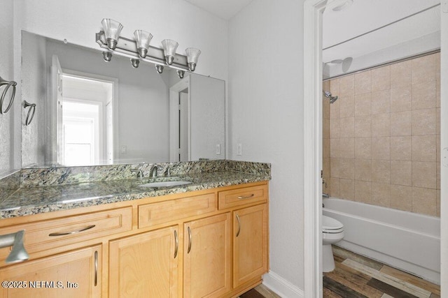 833 Shoreline Cir, Ponte Vedra Beach, FL 32082 - full bath featuring toilet, vanity, shower / bath combination, and wood finished floors