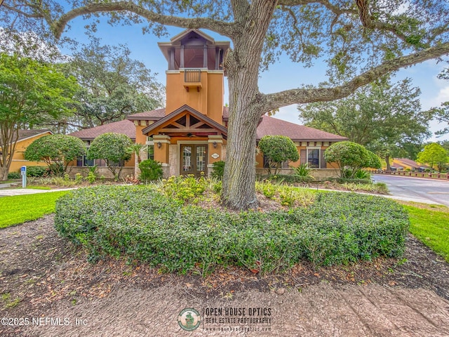 833 Shoreline Cir, Ponte Vedra Beach, FL 32082 - view of front of house with french doors, stucco siding, and roof with shingles