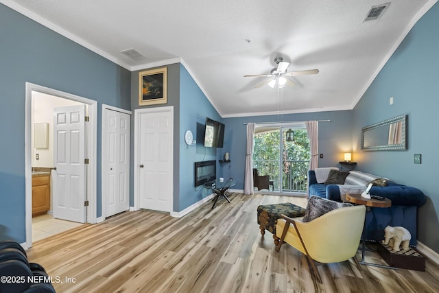 13808 Herons Landing Way Unit 8, Jacksonville, FL 32224 - living room with ornamental molding, ceiling fan, light wood-style flooring, and baseboards