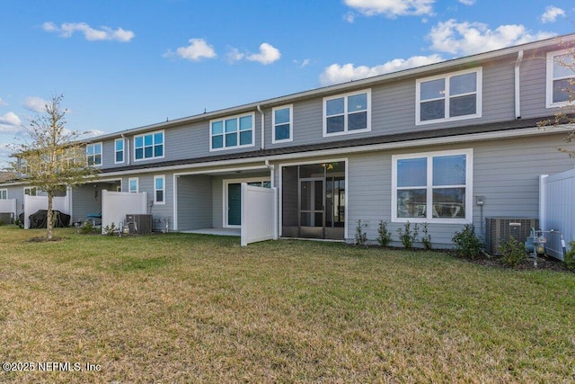 712 Cherry Elm Dr, Saint Augustine, FL 32092 - back of house with a yard and cooling unit