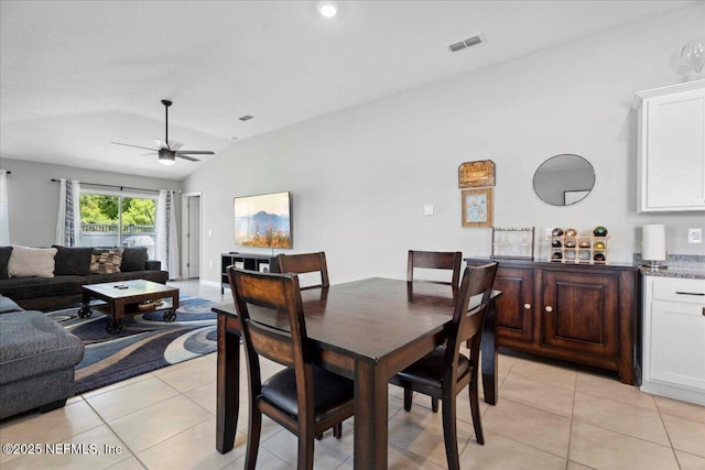 86815 Iron Rail Ct, Yulee, FL 32097 - dining space with light tile patterned floors, vaulted ceiling, and ceiling fan