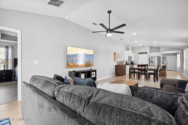 86815 Iron Rail Ct, Yulee, FL 32097 - living room with vaulted ceiling, light tile patterned floors, ceiling fan, baseboards, and recessed lighting