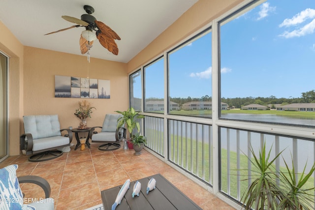 11889 Surfbird Cir Unit 10F, Jacksonville, FL 32256 - sunroom featuring a water view, tile patterned floors, and a residential view