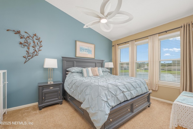 11889 Surfbird Cir Unit 10F, Jacksonville, FL 32256 - bedroom with light colored carpet, vaulted ceiling, baseboards, and a ceiling fan