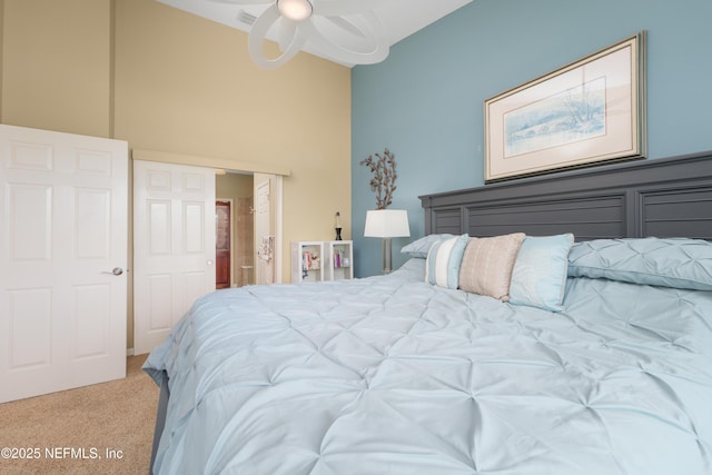 11889 Surfbird Cir Unit 10F, Jacksonville, FL 32256 - bedroom with carpet, a towering ceiling, and ceiling fan