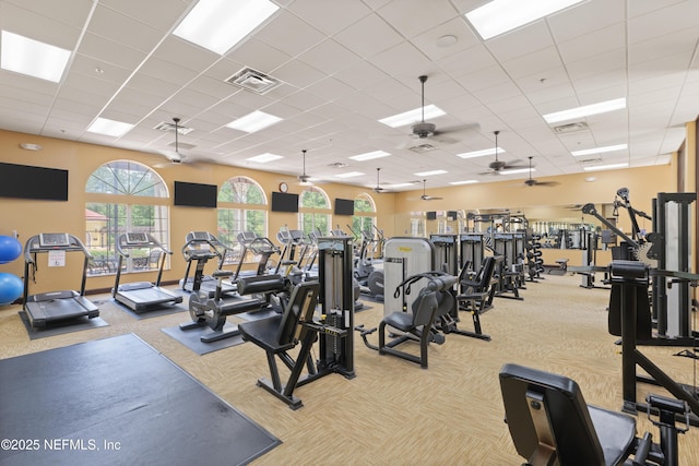 11889 Surfbird Cir Unit 10F, Jacksonville, FL 32256 - workout area with light carpet, ceiling fan, and a drop ceiling