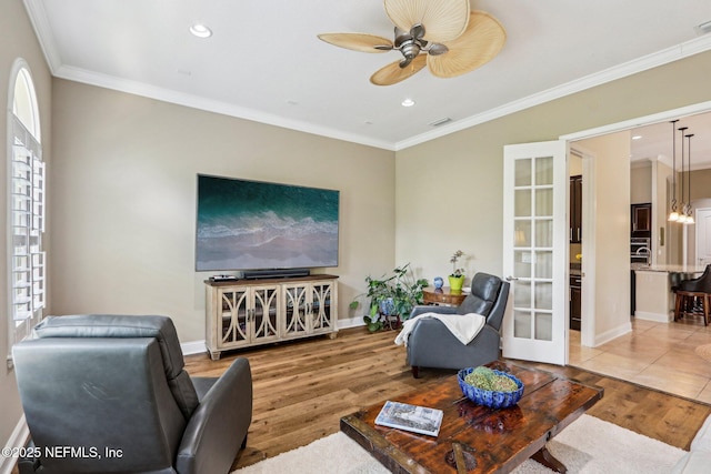 33 Tinker Ct, Fruit Cove, FL 32259 - living room with light wood finished floors, crown molding, a ceiling fan, recessed lighting, and baseboards