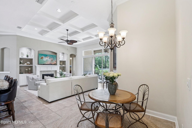 33 Tinker Ct, Fruit Cove, FL 32259 - dining space featuring built in features, a ceiling fan, a fireplace, light tile patterned floors, and coffered ceiling