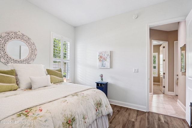 33 Tinker Ct, Fruit Cove, FL 32259 - bedroom with baseboards and wood finished floors