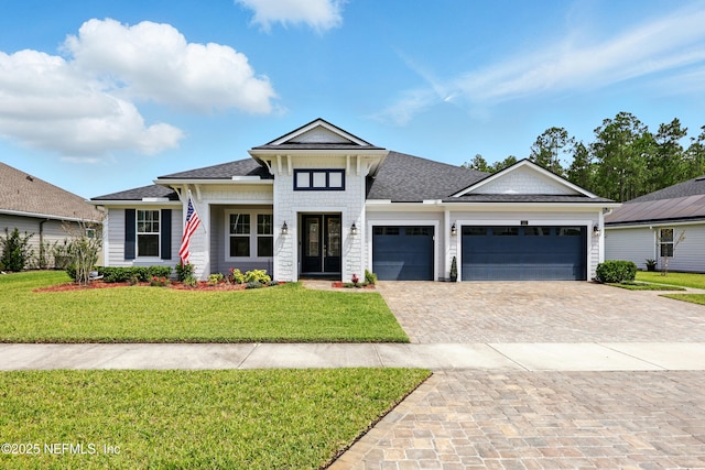 287 White Horse Way, Saint Johns, FL 32259 - view of front of house with decorative driveway, a garage, a front yard, and roof with shingles