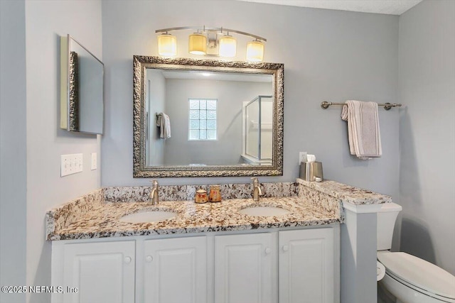 589 Prosperity Lake Dr, Saint Augustine, FL 32092 - full bath with toilet, double vanity, and a shower with door
