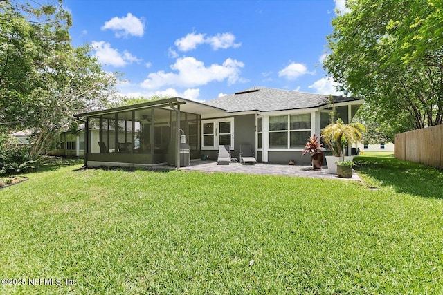 589 Prosperity Lake Dr, Saint Augustine, FL 32092 - rear view of property with a sunroom, a patio, and a shingled roof