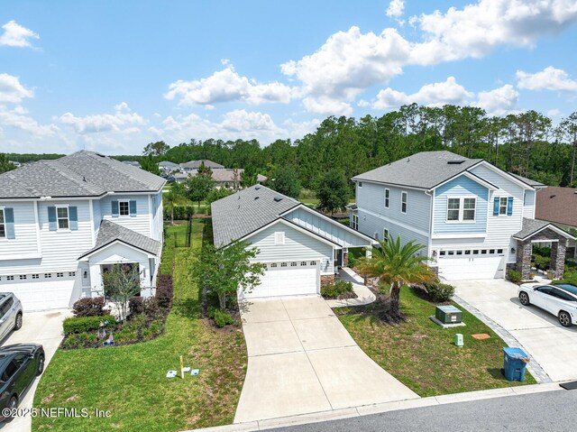 149 Ferndale Way, Saint Augustine, FL 32092 - view of front facade with a garage, concrete driveway, and a front lawn