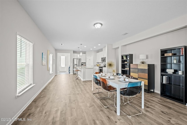 149 Ferndale Way, Saint Augustine, FL 32092 - dining space featuring light wood finished floors and baseboards