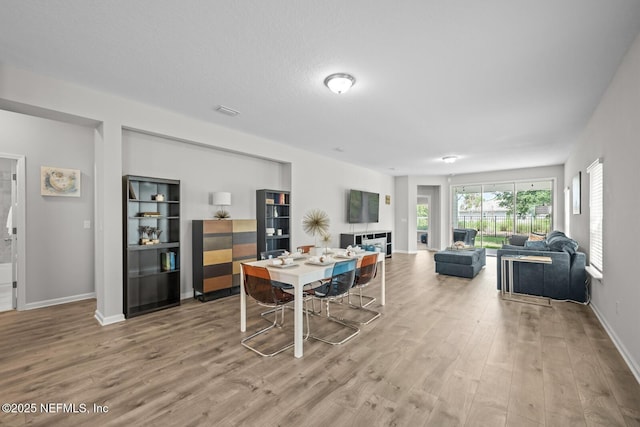 149 Ferndale Way, Saint Augustine, FL 32092 - dining room with wood finished floors and baseboards