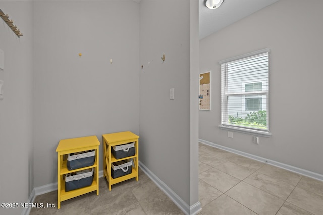 149 Ferndale Way, Saint Augustine, FL 32092 - rec room with baseboards and tile patterned flooring