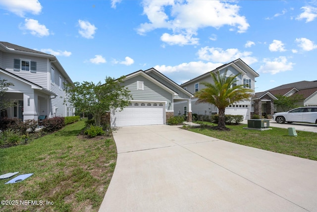 149 Ferndale Way, Saint Augustine, FL 32092 - view of front facade featuring driveway, a front lawn, and a garage