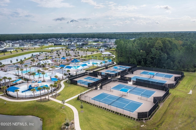 121 Thistleton Way, Saint Augustine, FL 32092 - drone / aerial view of a pool, a large body of water, and a heavily wooded area
