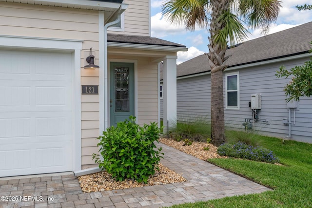 121 Thistleton Way, Saint Augustine, FL 32092 - doorway to property with a garage