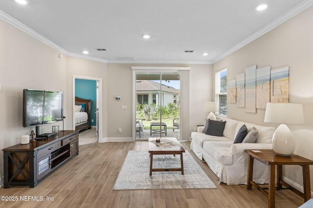 121 Thistleton Way, Saint Augustine, FL 32092 - living area with light wood-style flooring, recessed lighting, ornamental molding, and baseboards