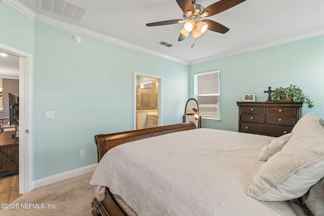 121 Thistleton Way, Saint Augustine, FL 32092 - bedroom featuring crown molding, carpet flooring, baseboards, a ceiling fan, and ensuite bathroom
