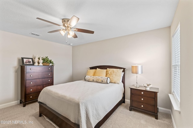 121 Thistleton Way, Saint Augustine, FL 32092 - bedroom with light colored carpet, baseboards, and ceiling fan