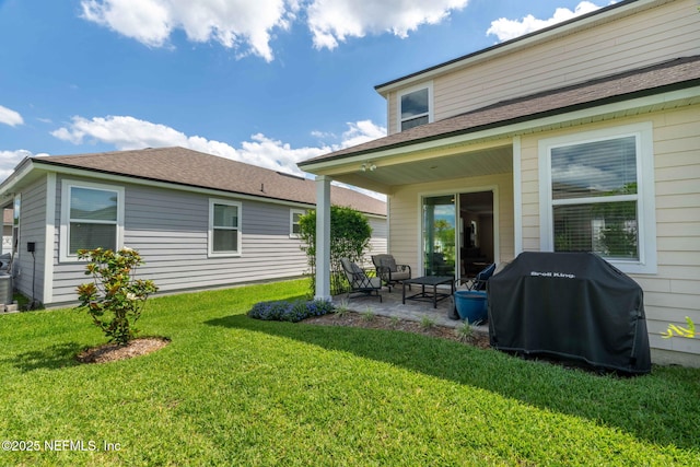 121 Thistleton Way, Saint Augustine, FL 32092 - back of house with a patio, a yard, and central air condition unit